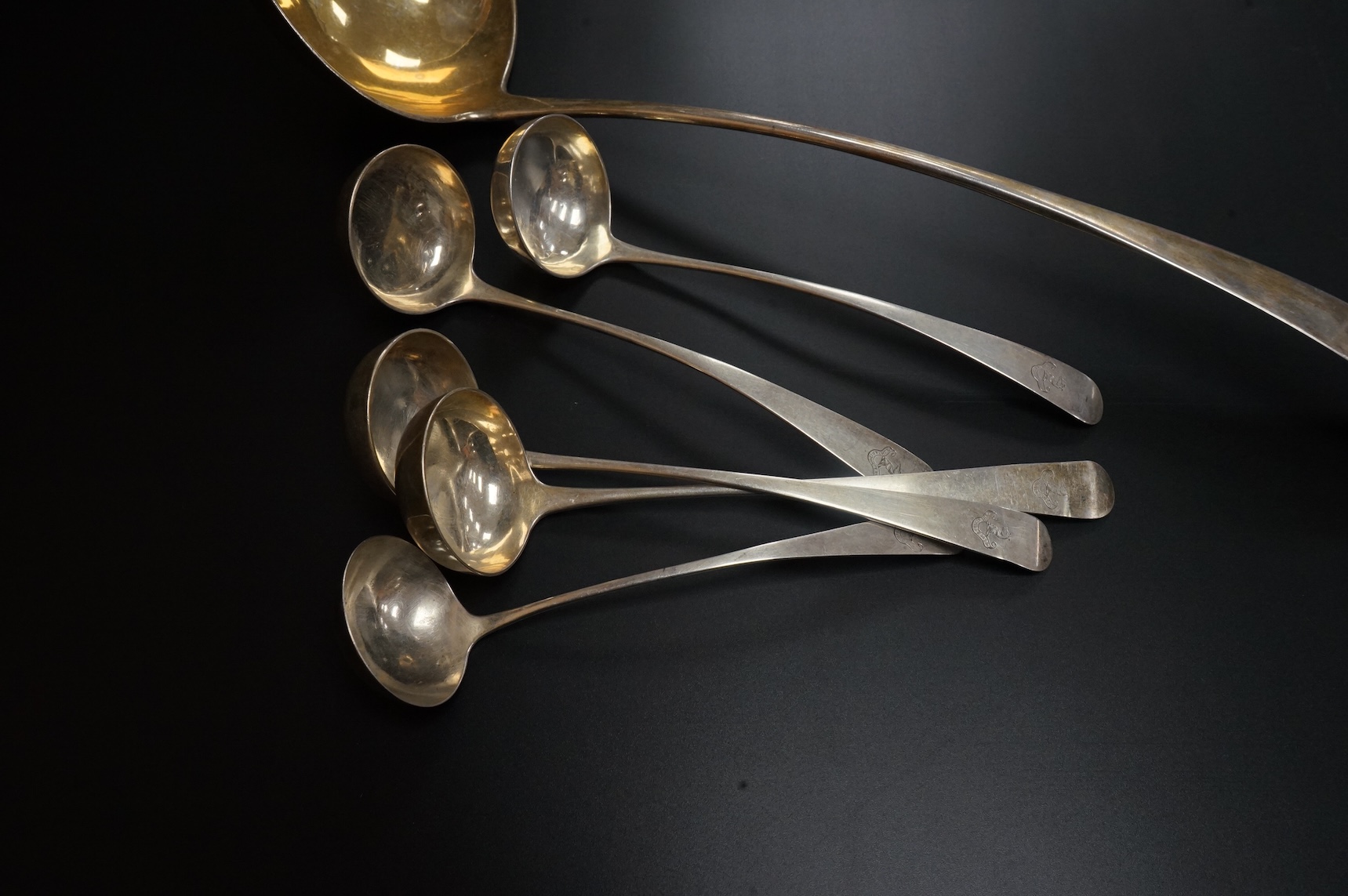 A set of four George III Scottish silver Old English pattern toddy ladles, James McKay, Edinburgh, 1809, 17.4cm, one other smaller Scottish silver ladle and a George III Scottish silver Celtic tip soup ladle, Francis How